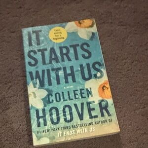 Teal and Orange Floral Paperback - Side View